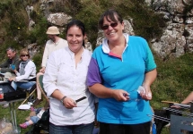Julie-Ann McMullan and Liz Withers working hard on the barbeque. Photo: MB